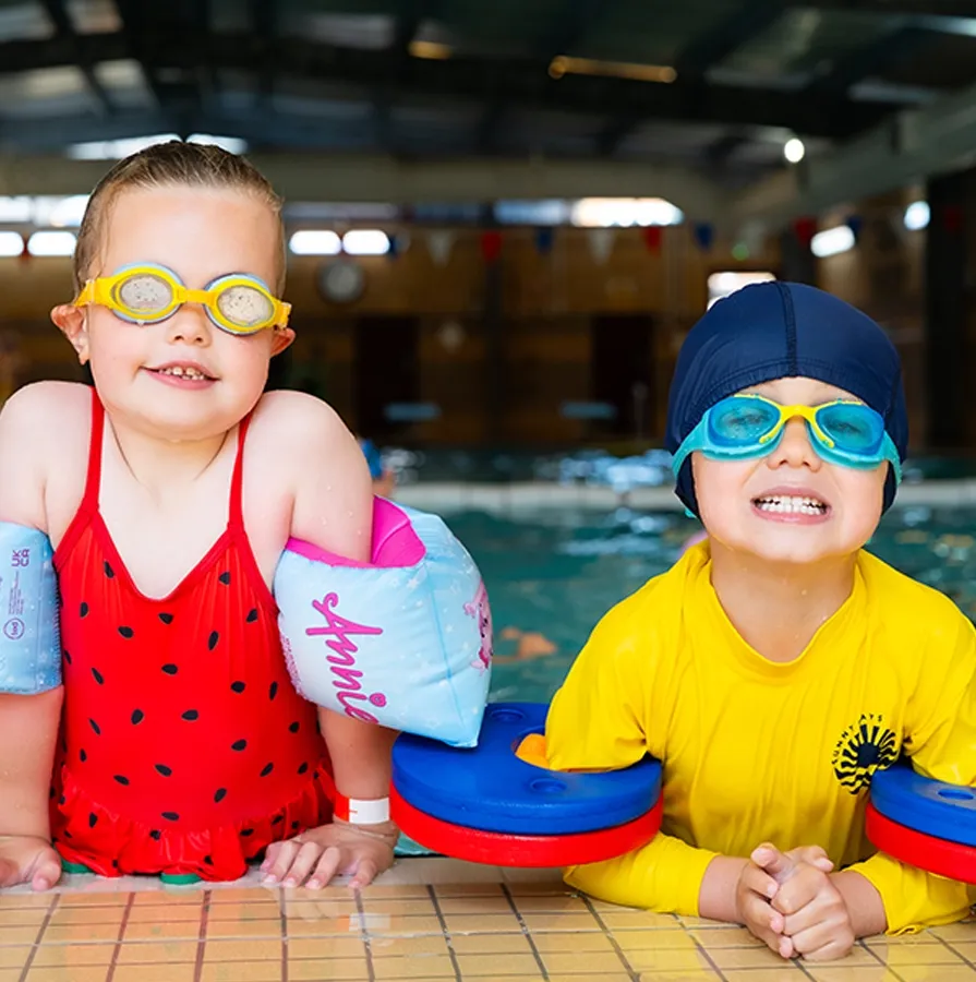 Children wearing swimming goggles in the pool at Warlingham Holiday Camp