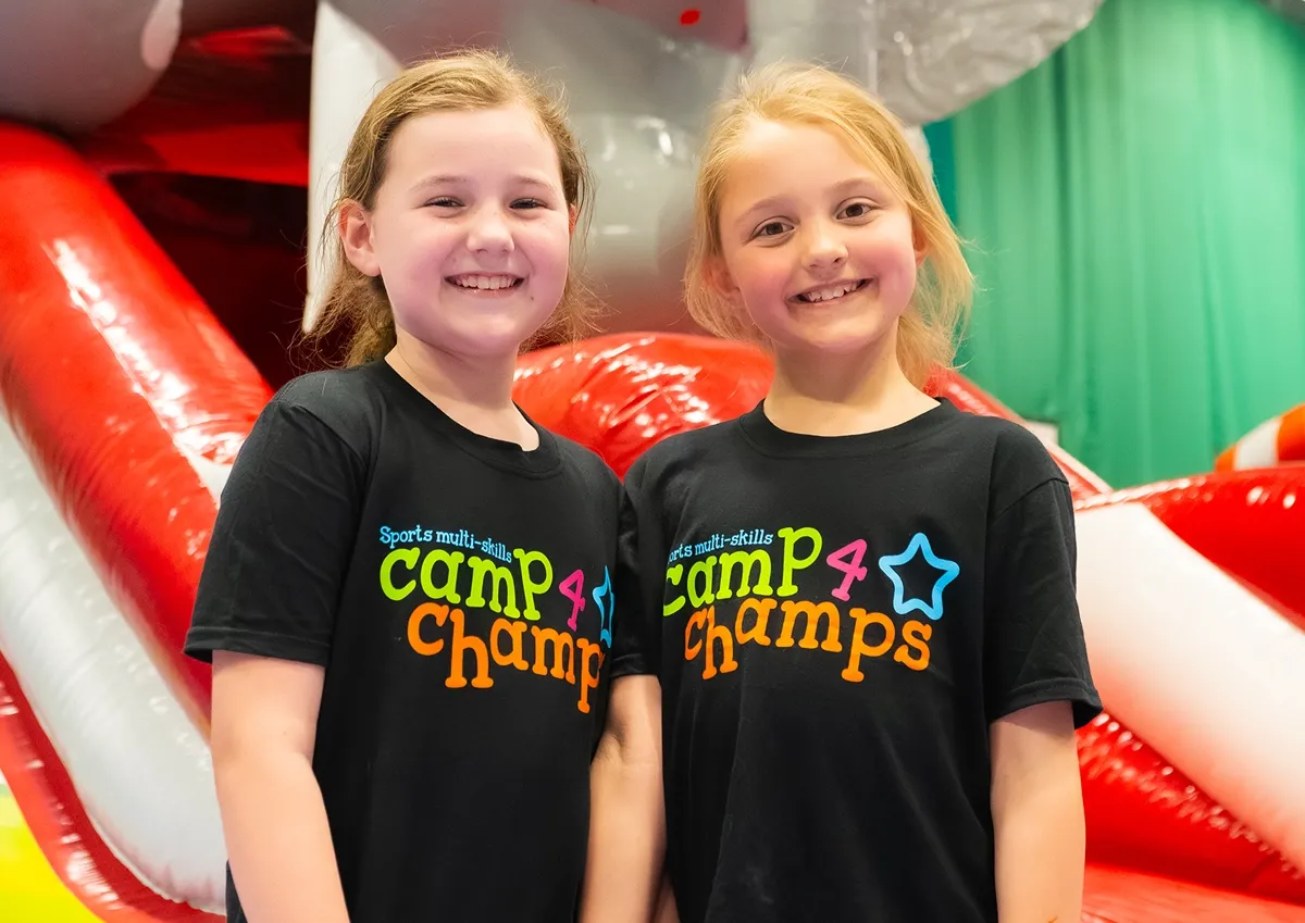 Southend Holiday Camp hero image Children smiling in Camp 4 Champs shirts for Southend Holiday Camp