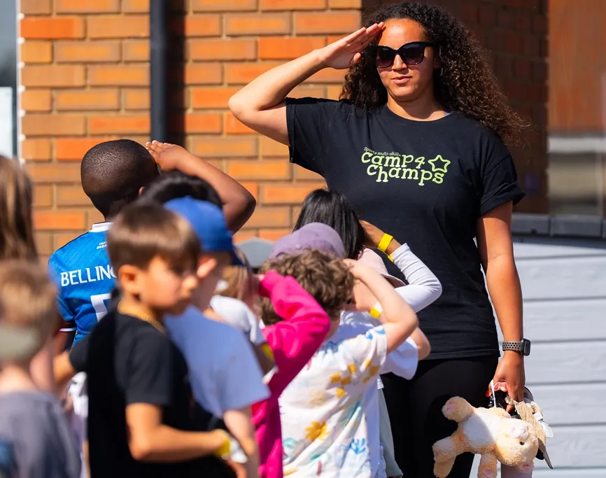 Camp 4 Champs staff member supervising children at a holiday camp